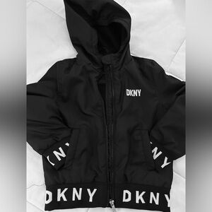 DKNY Unisex Black Windbreaker Size T5/6 Body fleece lined arms slight quilt.